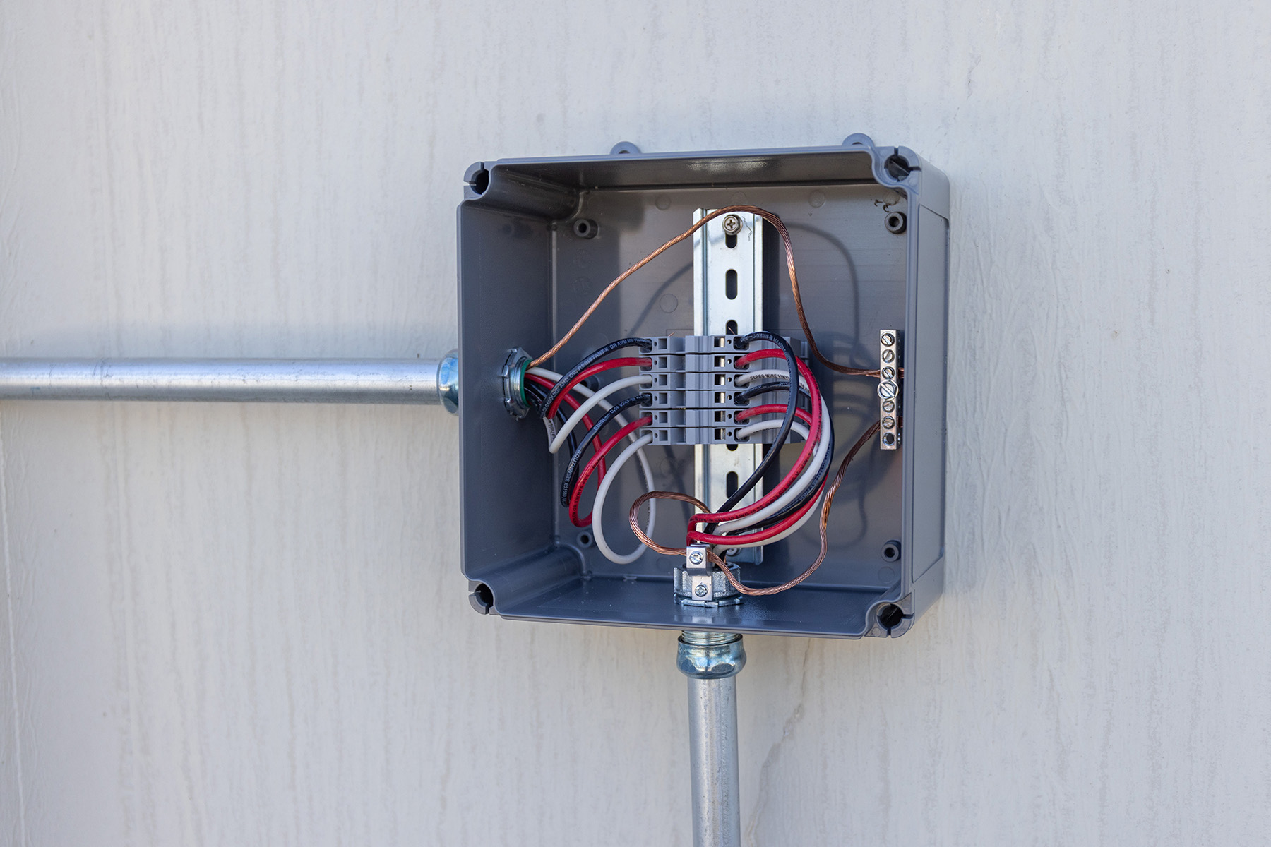 Rampage enclosure wired on a din rail with terminal blocks